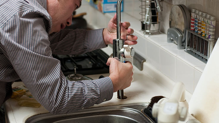plumber repairing working