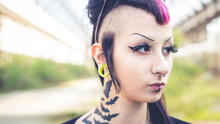 young beautiful punk girl piercing